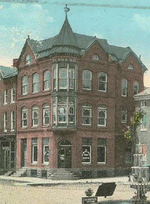 Vintage postcard view of the bank building