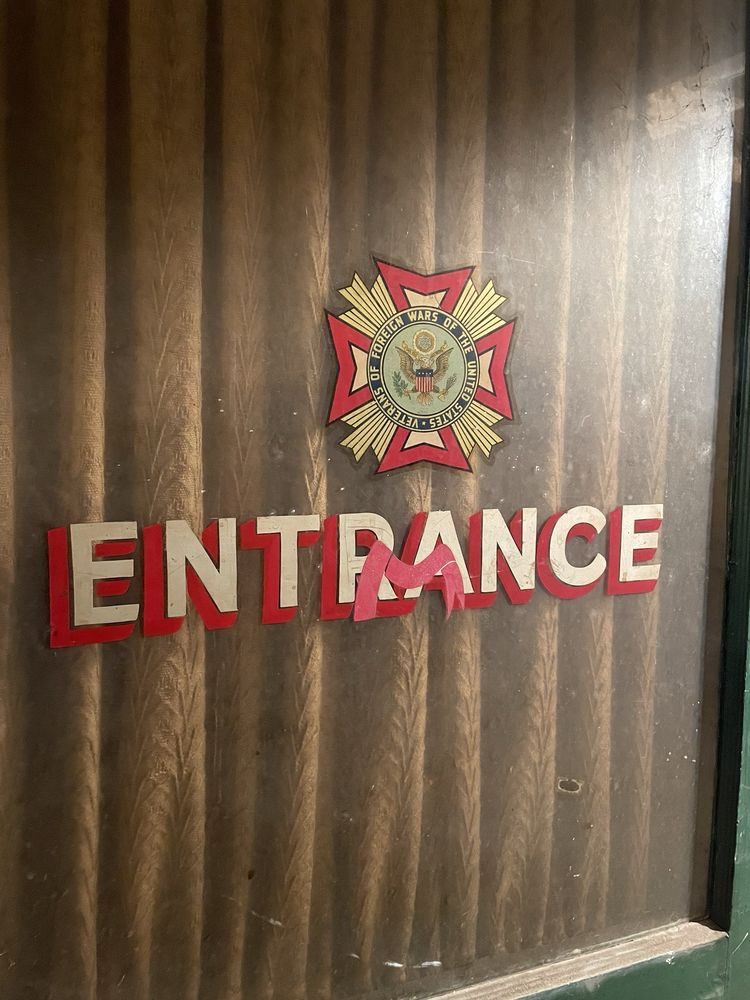 The entrance door with the VFW emblem